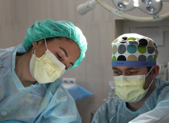 surgeons performing surgery