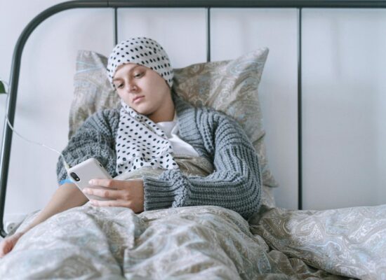 woman lying on the bed with intravenous line