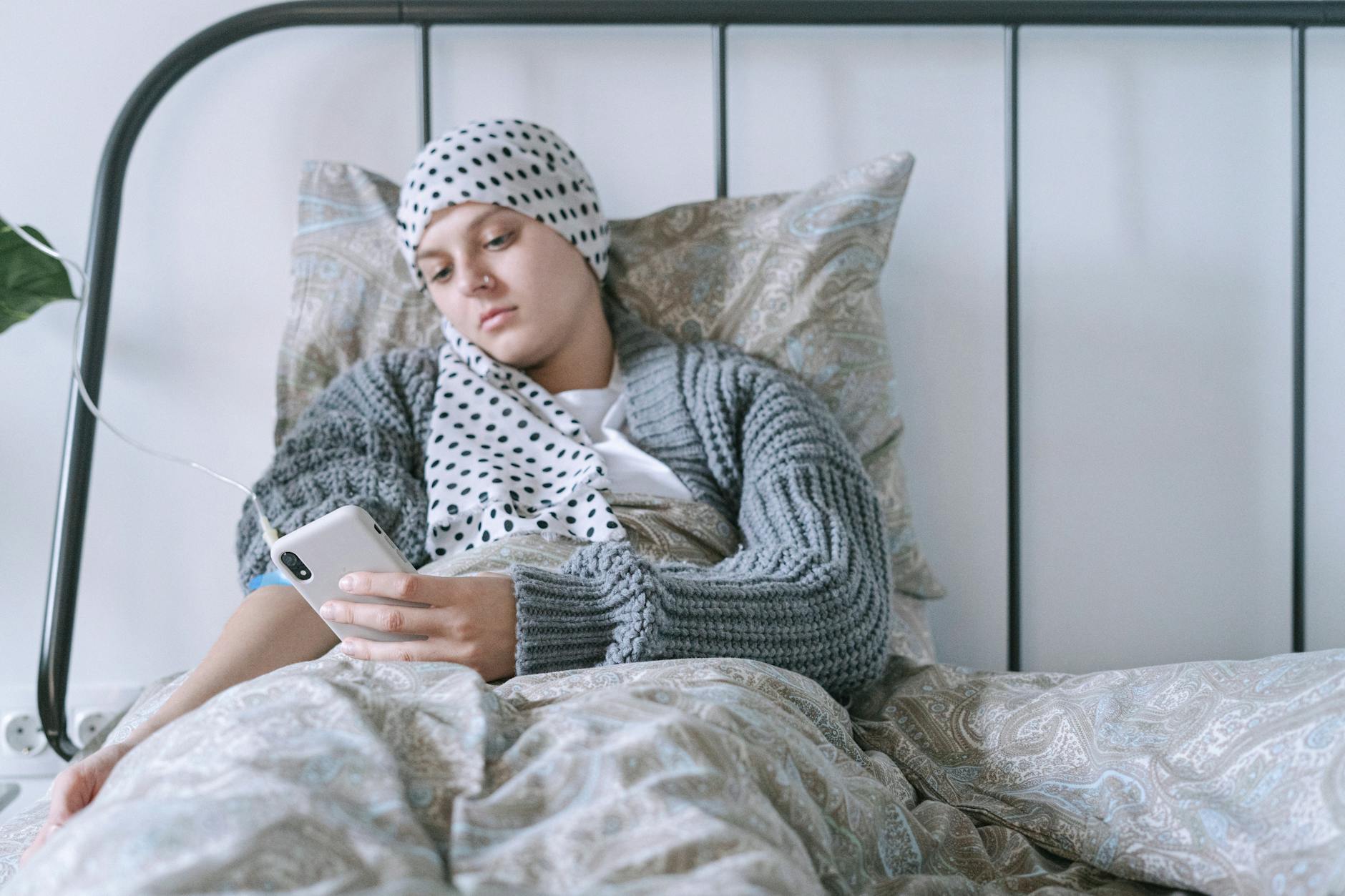 woman lying on the bed with intravenous line